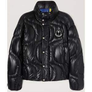 Black lacquered nylon down jacket with wave stitching, black terry patch